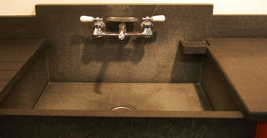 soapstone drainboard and sink with soap dish